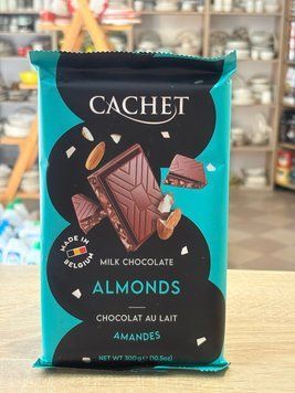 Шоколад Cachet молочний з мигдалем 300 г 00510 фото